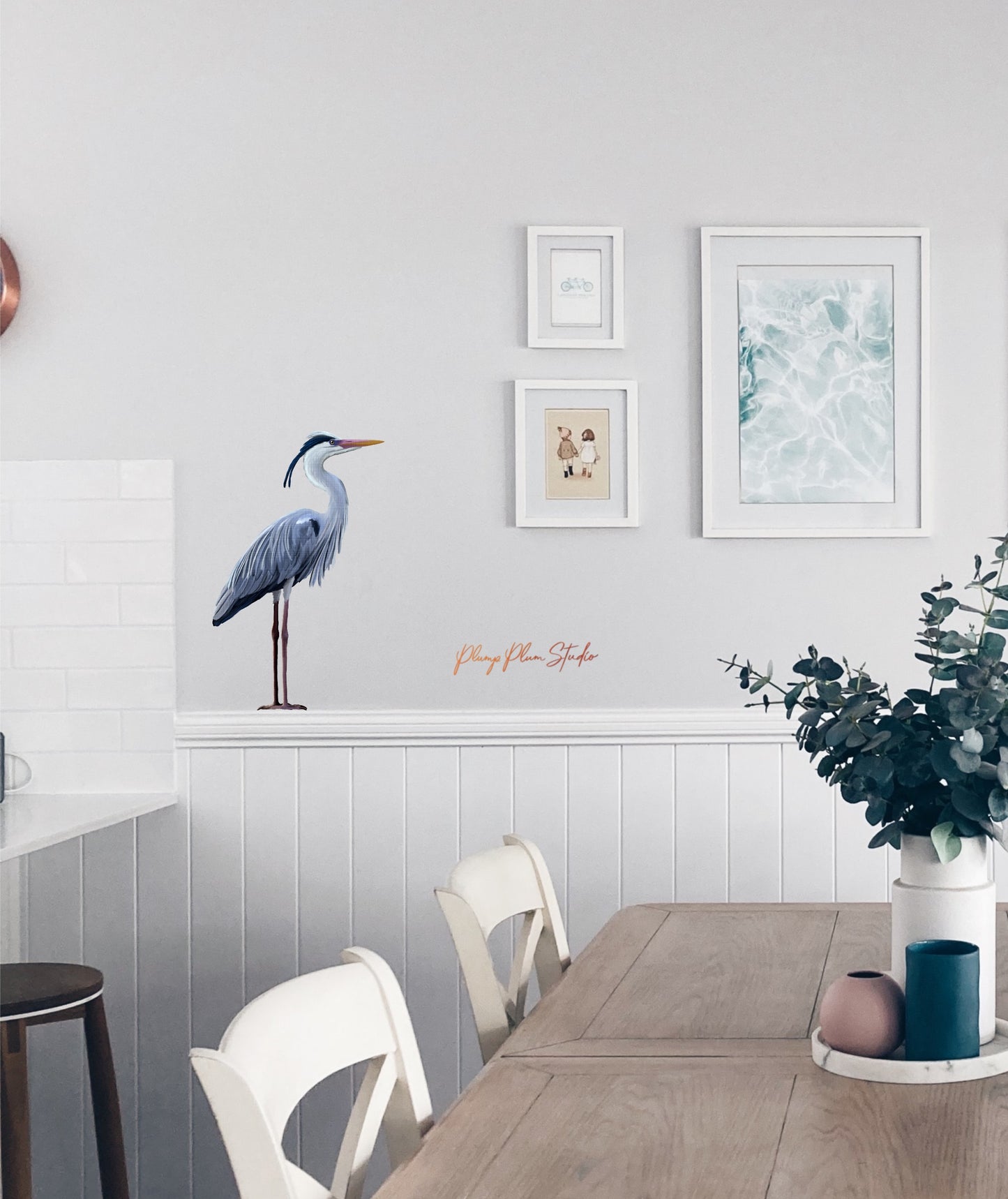 Large Blue Heron bird art applied to a living room wall, perfect for Hamptons style coastal home decor.