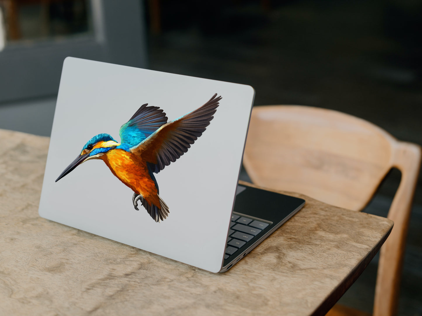 Realistic Kingfisher bird wall sticker applied to a laptop showing the detail of the flying bird art