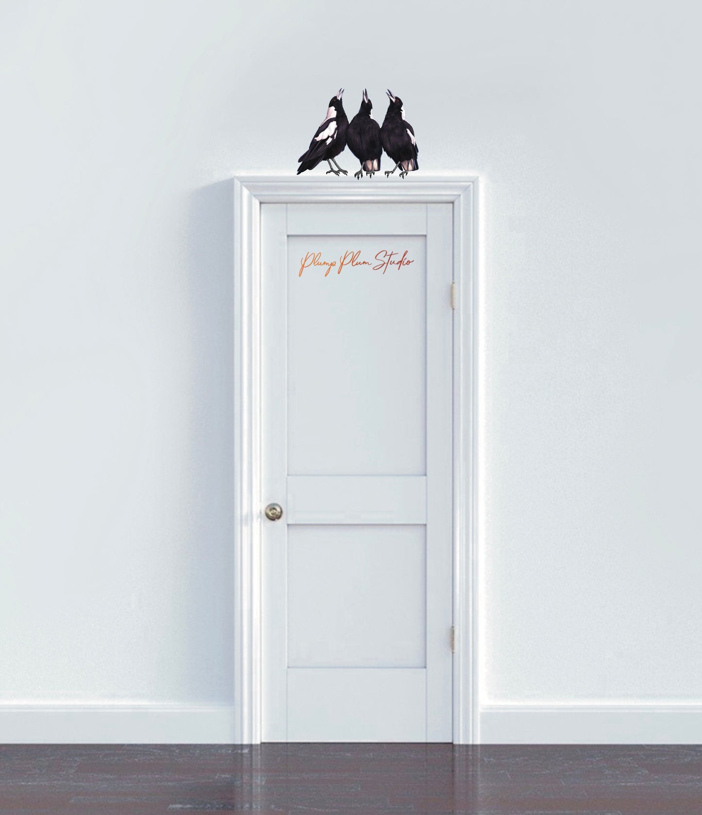 Large Australian Magpie wall decal positioned above a hallway door, creating a life-sized nature-inspired statement.